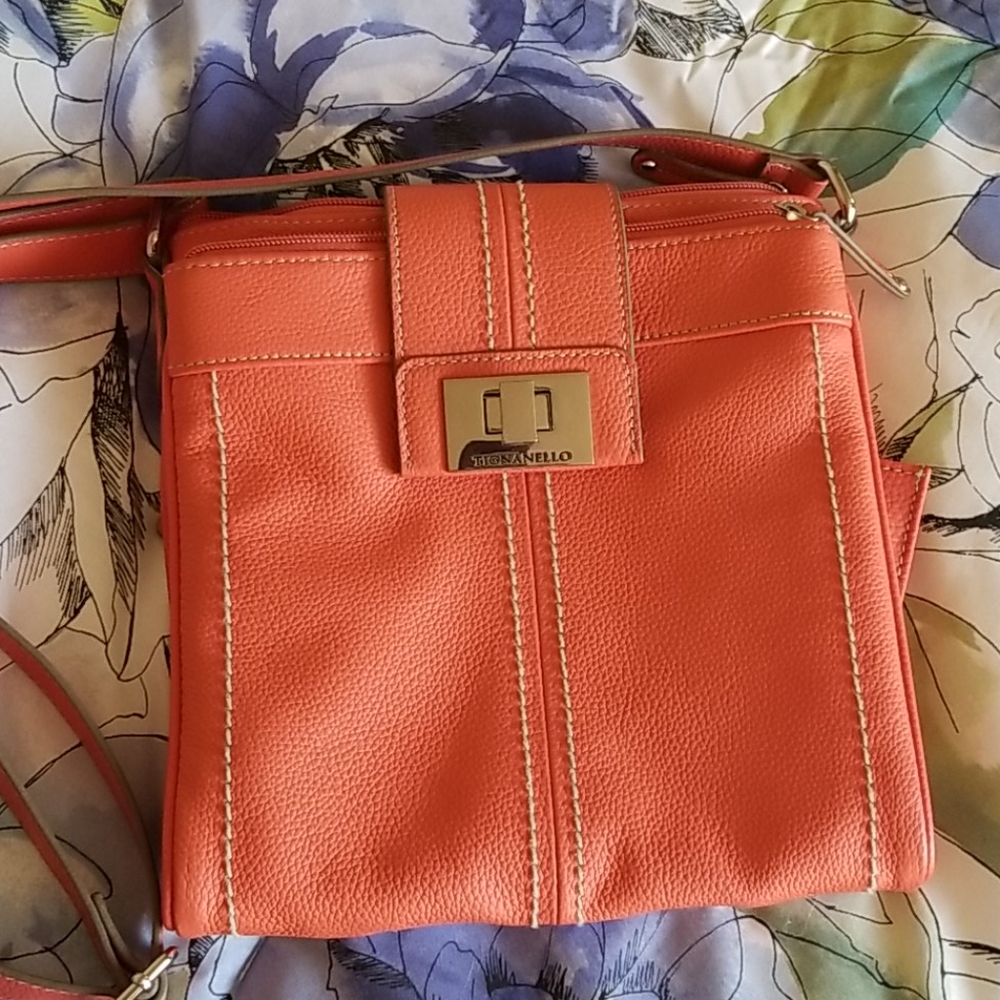 Orange Tignanello crossbody leather purse